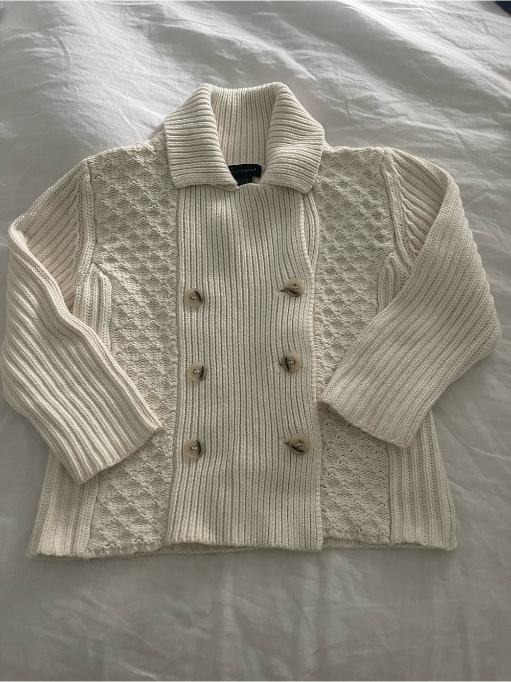100 % cotton double breasted ivory fisherman’s sweater. Size small